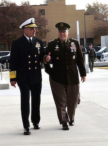 U.S. Navy Adm. Charles “Chas” A. Richard, U.S. Strategic Command (USSTRATCOM) commander walks alongside and Gen. Mark A. Milley, Chairman of the Joint Chiefs of Staff outside the USSTRATCOM Command and Control Facility (C2F) at Offutt Air Force Base, Neb., Nov. 18, 2019. Adm. Richard took command of USSTRATCOM in a ceremony at the C2F Nov. 18, at which Milley spoke and expressed his full confidence in his expertise, leadership and vision to lead the command. U.S. Strategic Command (USSTRATCOM) is a global warfighting command and the ultimate guarantor of national and allied security with forces and capability that underpin and enable all other joint force operations. (U.S. Air Force photo by Master Sgt. April Wickes)