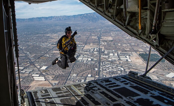 A Soldier jumps out of an aircraft.