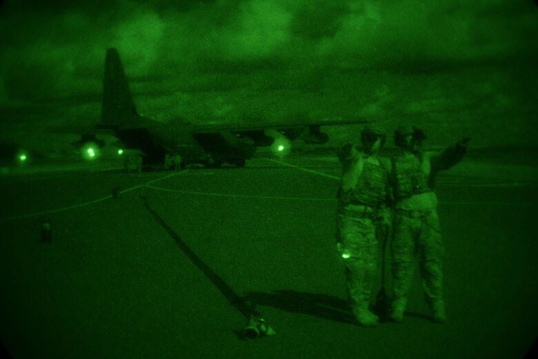 Forward Area Refueling Point Airmen temporarily assigned to the 18th Wing, Kadena Air Base, Japan, point toward mission objectives supporting the 353rd Special Operations Group during  Exercise Gryphon Pacific 20-1, Nov. 15, 2019.