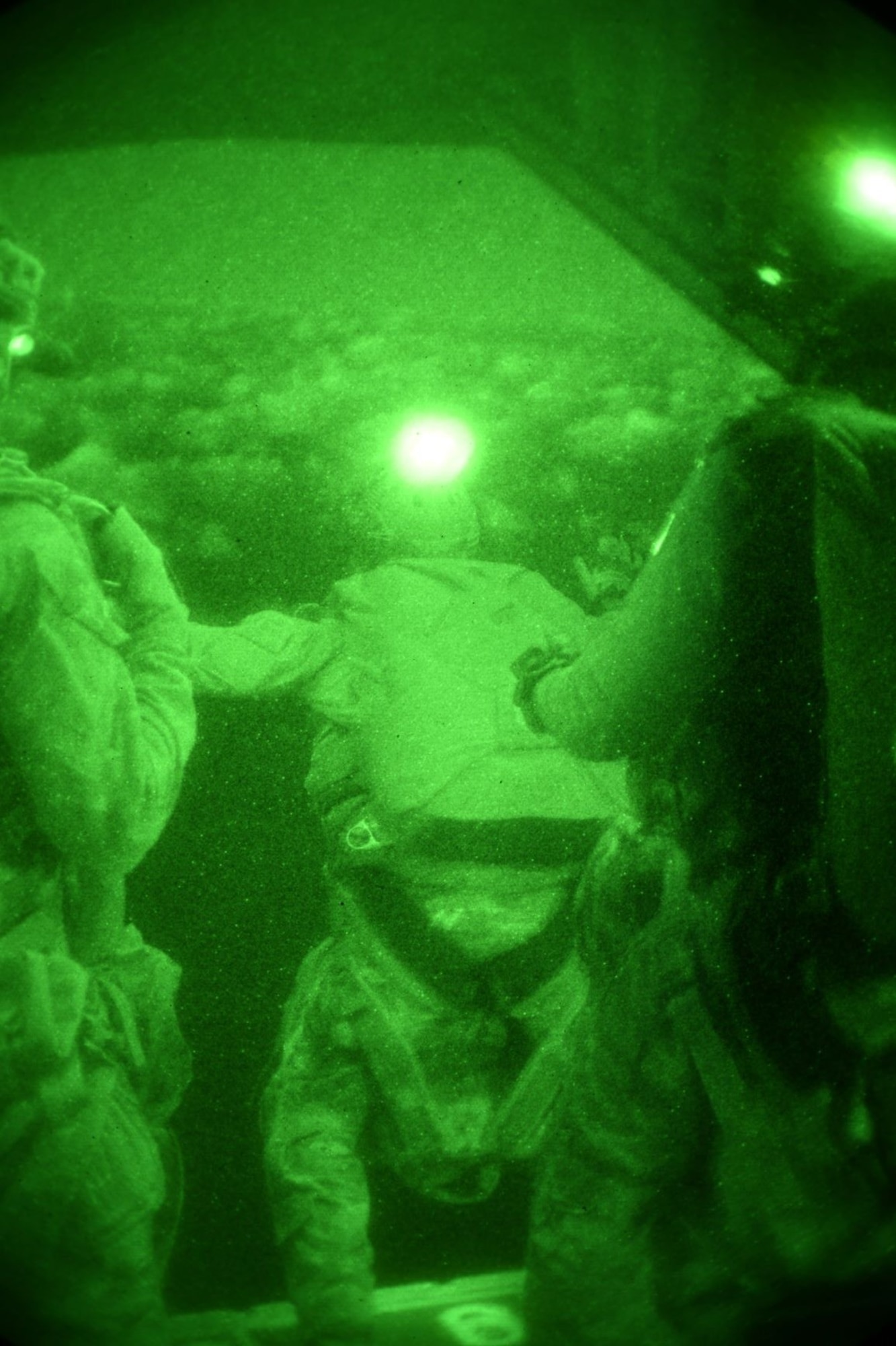 Airmen from the 320th Special Tactics Squadron perform a night jump above Wake Island, Wake Atoll, during Exercise Gryphon Pacific 20-1, Nov. 15, 2019, over the Pacific Ocean.