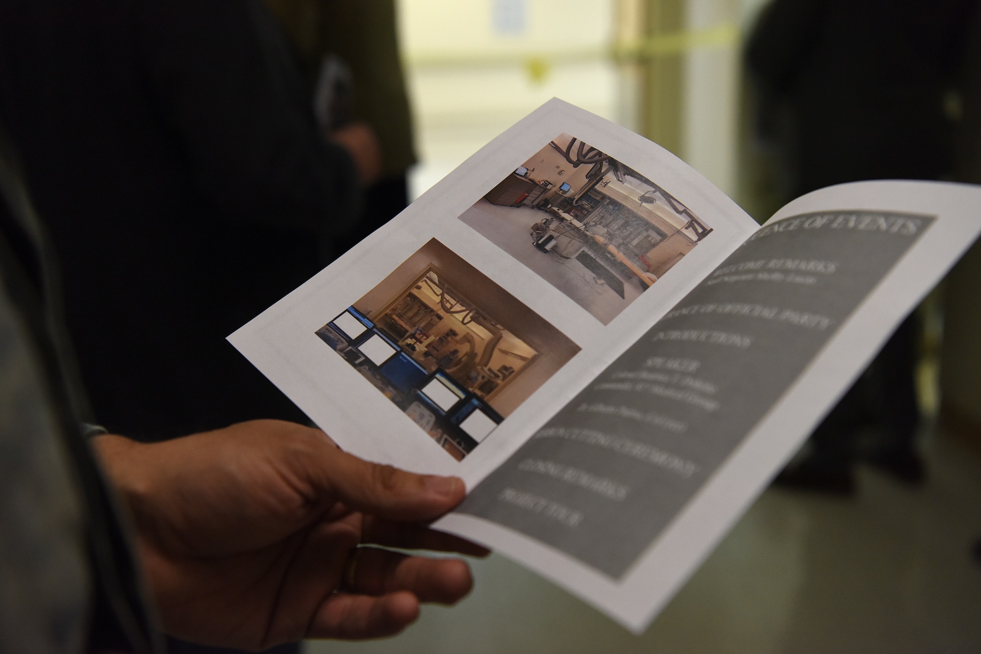 U.S. Air Force Col. Shahid Zaidi, 81st Medical Group medical staff chief, holds a flyer during the cardiac catheterization laboratory ribbon cutting ceremony inside Keesler Medical Center at Keesler Air Force Base, Mississippi, Nov. 15, 2019. The lab was upgraded with an entire suite of technology to provide better and safer care for patients and the surgical team. (U.S. Air Force photo by Senior Airman Suzie Plotnikov)