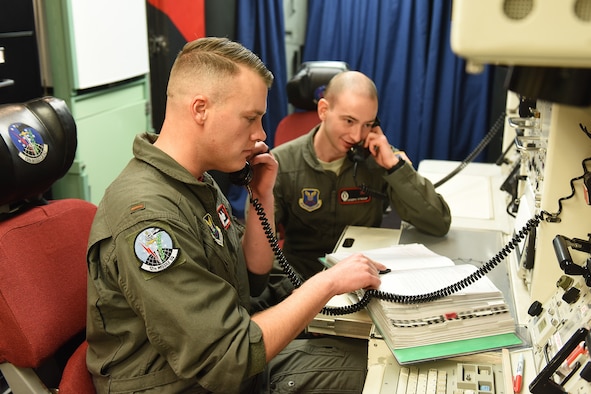 Second Lt. Clay Barnard, 12th Missile Squadron intercontinental ballistic missile combat crew deputy, and 2nd Lt. Joseph Stroup, 12th Missile Squadron ICBM combat crew commander, work in a launch control center Nov. 15, 2019, near Malmstrom Air Force Base, Mont.