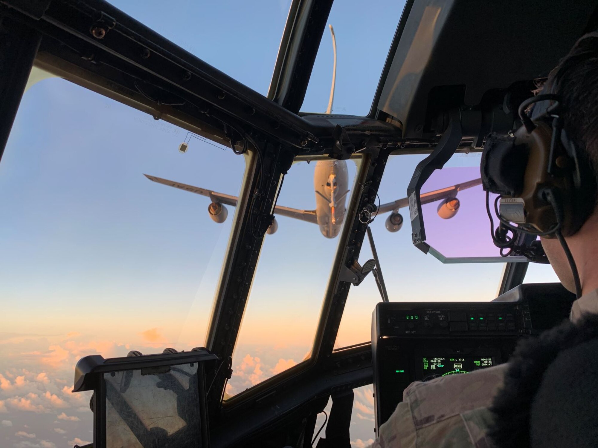 Aircrew assigned to the 17th Special Operations Squadron, 353rd Special Operations Group, Kadena Air Base, Japan, prepare their MC-130J Commando II for aerial refueling with fellow Team Kadena members flying a KC-135 Stratotanker from the 909th Air Refueling Squadron, during Exercise Gryphon Pacific 20-1, Nov. 15, 2019, over the Pacific Ocean.