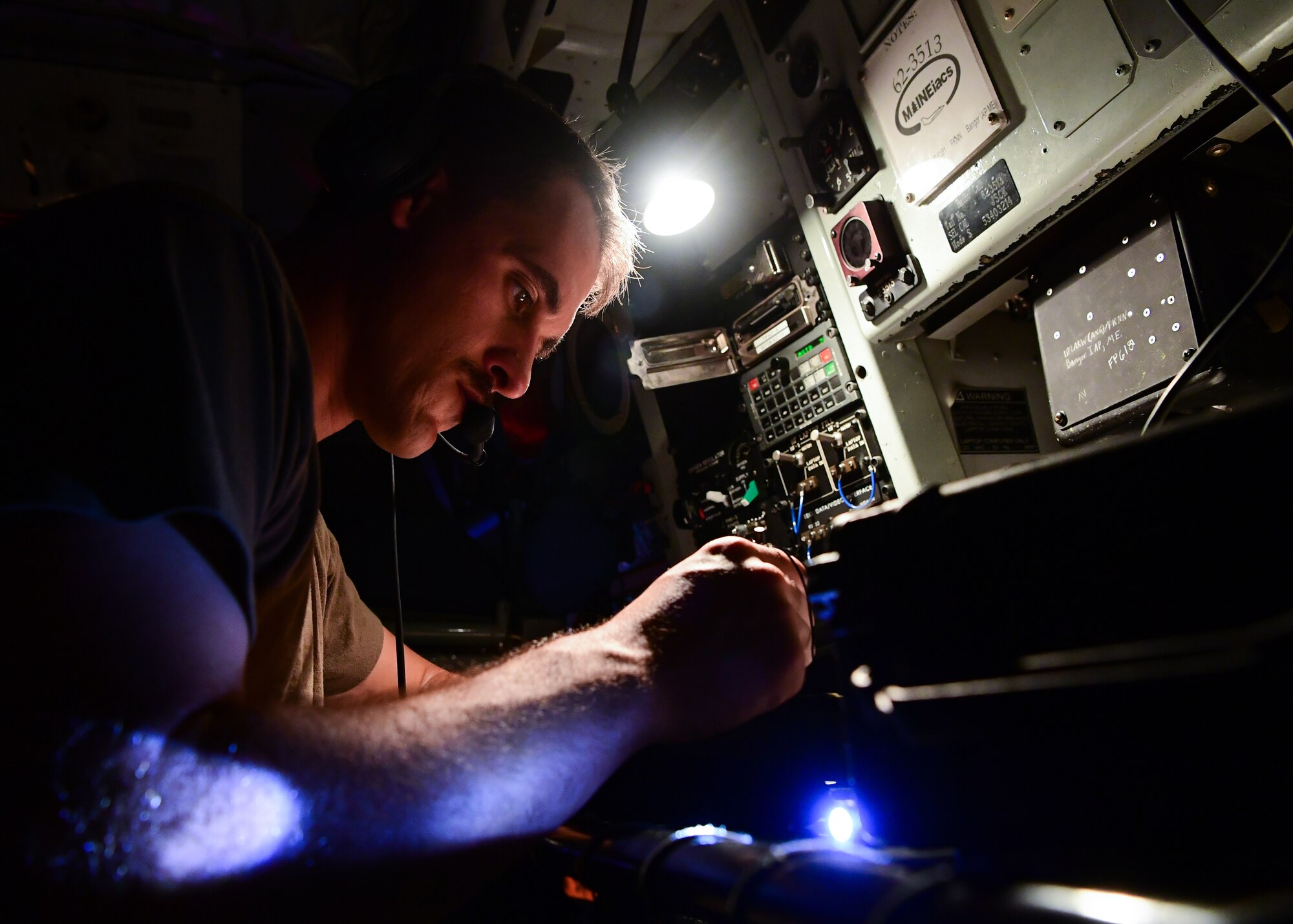 A U.S. Air Force boom operator assigned to the 28th Expeditionary Air Refueling Squadron, conducts a preflight checklist on a KC-135 Stratotanker at Al Udeid Air Base, Qatar, Sept. 28, 2019.