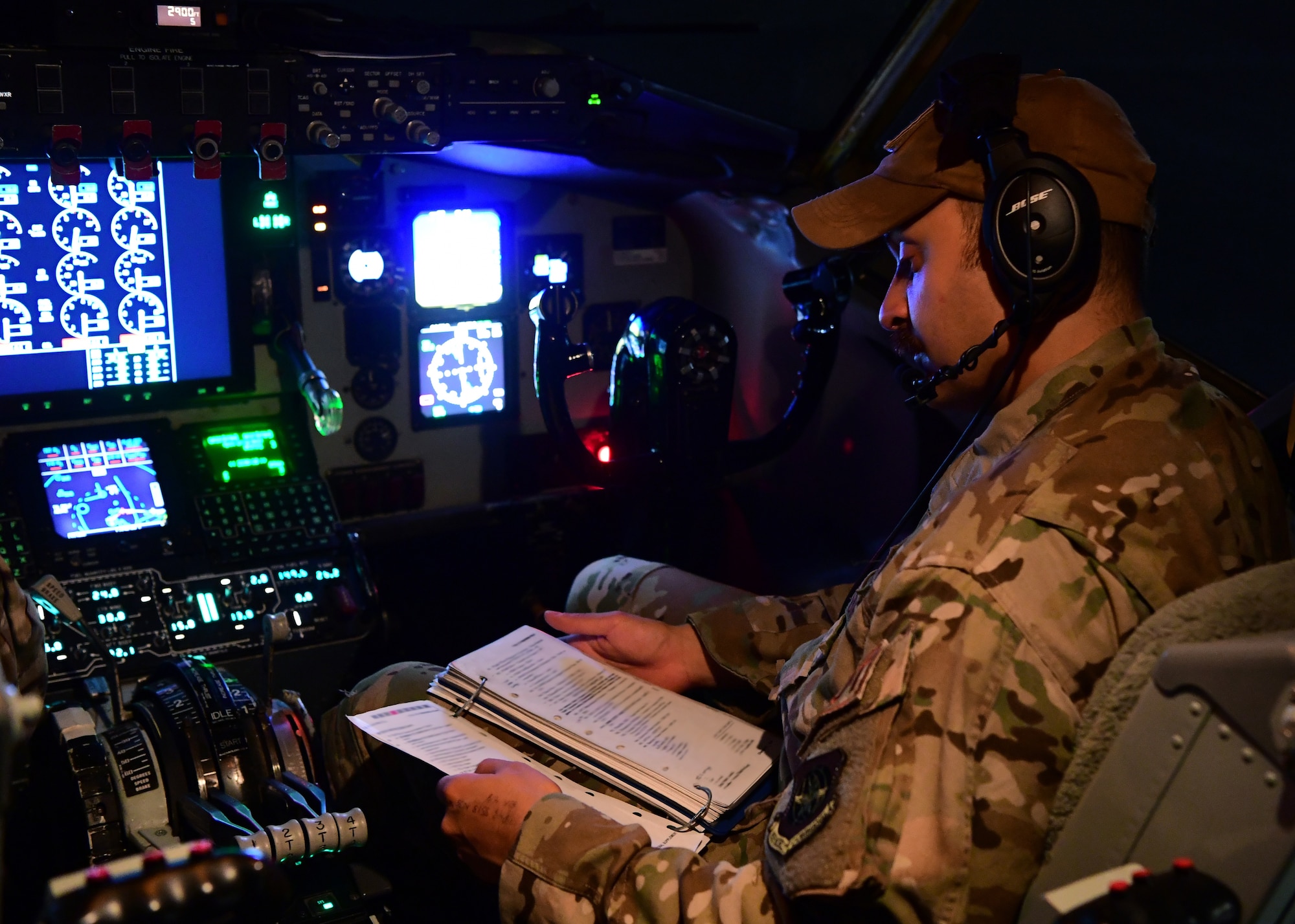 A U.S. Air Force pilot assigned to the 28th Expeditionary Air Refueling Squadron, conducts a preflight checklist on a KC-135 Stratotanker at Al Udeid Air Base, Qatar, Sept. 28, 2019.