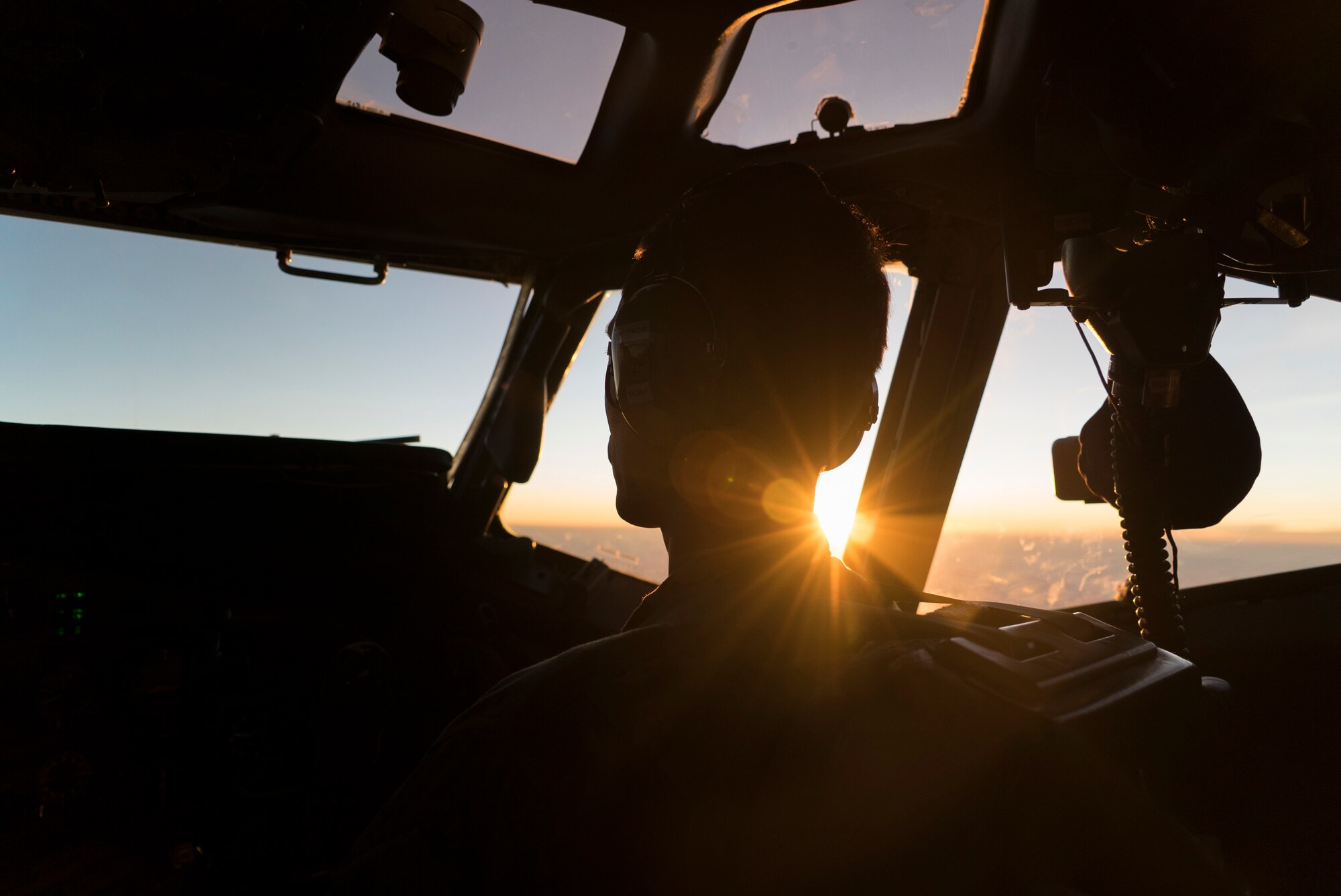 A U.S. Air Force pilot assigned to the 7th Expeditionary Airborne Command and Control Squadron, conducts operations in an E-8 Joint STARS above an undisclosed location, Sept. 28, 2019.