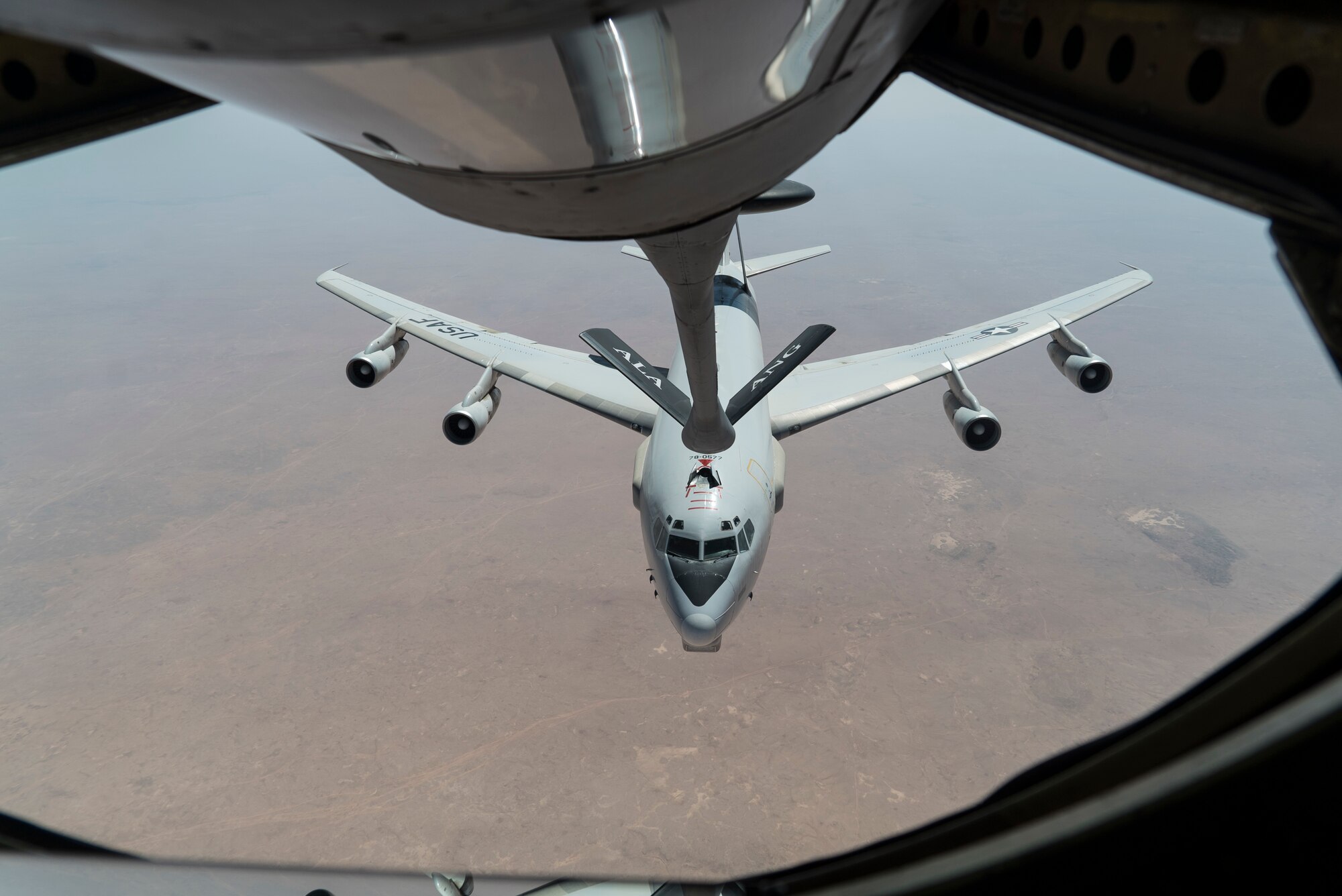 An E-3 Airborne Warning and Control System (AWACS) departs after in-flight refueling from a KC-135 Stratotanker, October 4, 2019 over an undisclosed location.