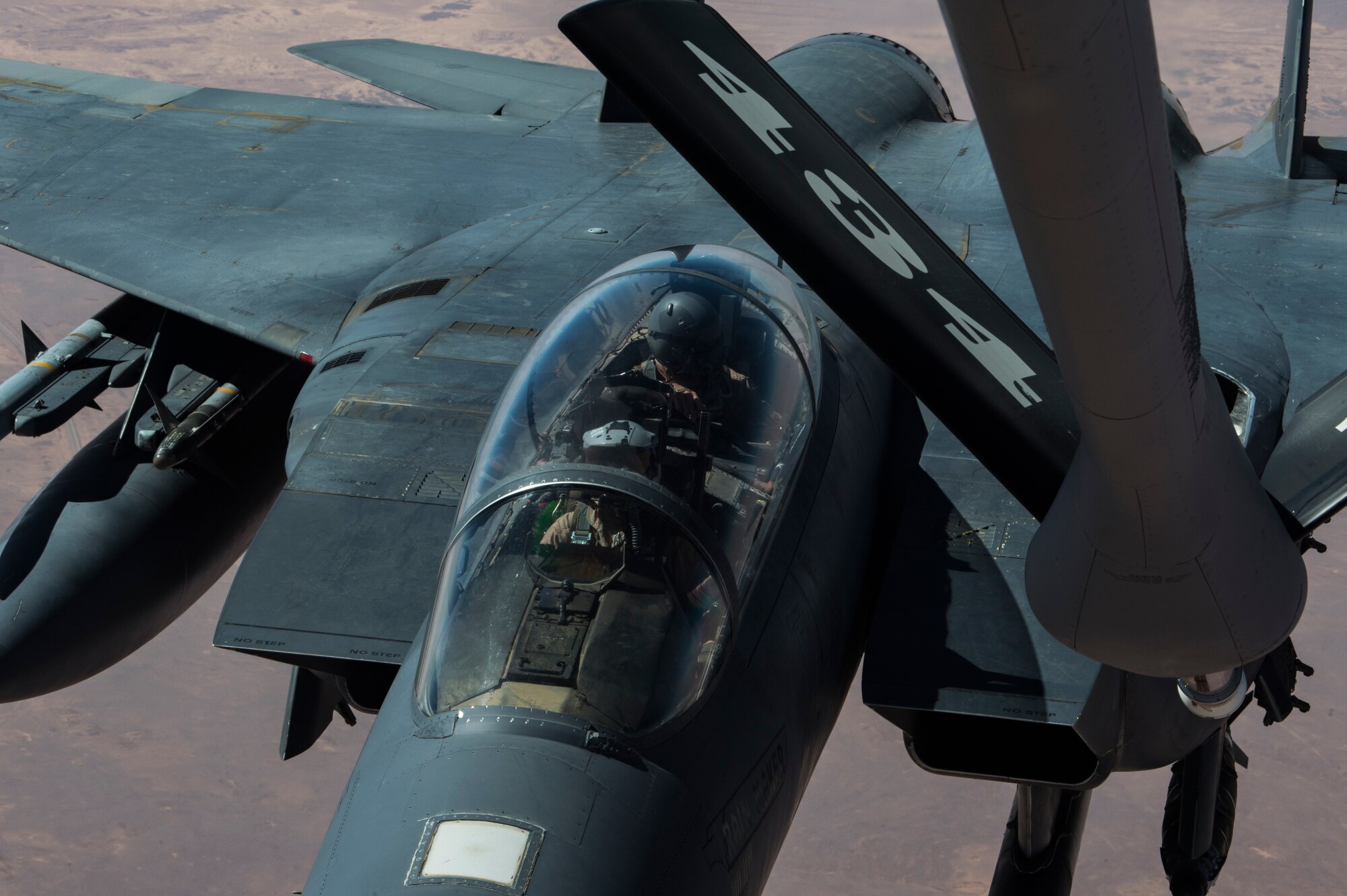 A U.S. Air Force F-15 Strike Eagle prepares to connect with a KC-135 Stratotanker assigned to the 28th Expeditionary Air Refueling Squadron, Al Udeid Air Base, Qatar, above an undisclosed location, Oct. 10, 2019.