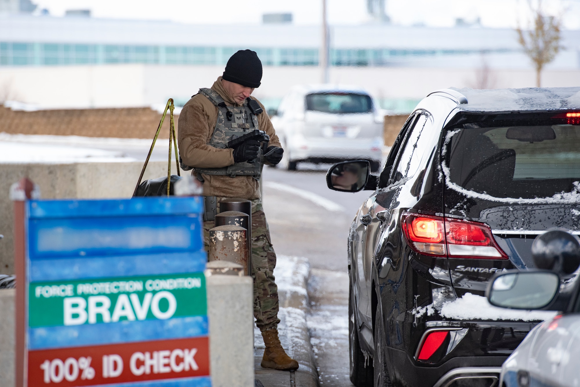 Senior Airman Nathanuel Davis, 88th Security Forces Squadron installation entry controller, performs an ID check of incoming drivers. A new gate for Area A, Gate 26A, is now open, weekdays 6 a.m. to 6 p.m., for both commercial and passenger vehicles. The new gate is located off State Highway 235, also known as North Central Avenue, at the first traffic light north of the Highway 235 and Broad Street intersection in Fairborn. Gate 26A will also be open on Saturdays from 6 a.m. to 2 p.m., for commercial vehicles only.