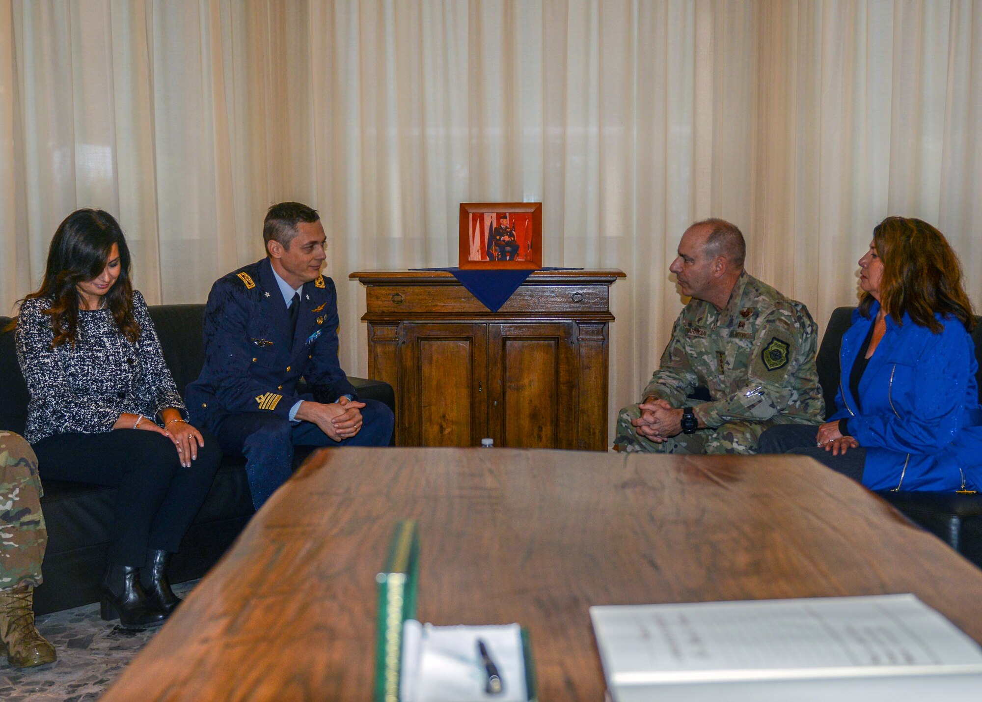 U.S. Air Force Gen. Jeffrey L. Harrigian, U.S. Air Forces in Europe and Air Forces Africa commander, talks with Italian Air Force Col. Luca Crovatti, ITAF base commander, at Aviano Air Base, Italy, Nov. 15, 2019. Harrigian has served in a variety of flying and staff assignments, including Deputy Director for Strategy, Plans and Assessments, U.S. Forces-Iraq, in support of Operation Iraqi Freedom and as Chief of the Joint Exercise Division at NATO's Joint Warfare Center, Stavanger, Norway. (U.S. Air Force photo by Airman Thomas S. Keisler IV)