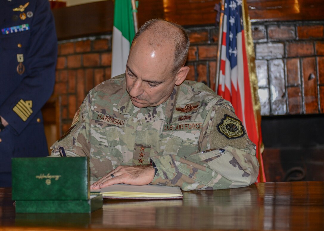 U.S. Air Force Gen. Jeffrey L. Harrigian, U.S. Air Forces in Europe and Air Forces Africa commander, signs a guest book at the Italian Air Force Club, Aviano Air Base, Italy, Nov. 15, 2019. Gen. Harrigian was commissioned in 1985 as a graduate of the U.S. Air Force Academy. (U.S. Air Force photo by Airman Thomas S. Keisler IV)