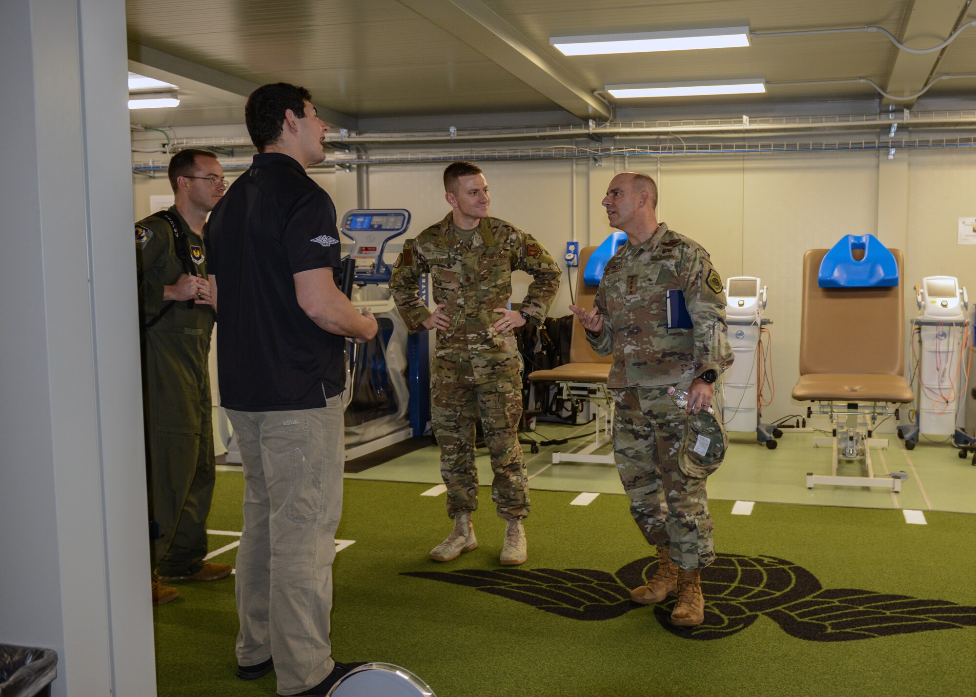 U.S. Air Force Gen. Jeffrey L. Harrigian, U.S. Air Forces in Europe and Air Forces Africa commander, talks with members of the 31st Fighter Wing at Aviano Air Base, Italy, Nov. 15, 2019. The mission of the 31st Fighter Wing is to deter through safe, secure, effective operations. (U.S. Air Force photo by Airman Thomas S. Keisler IV)