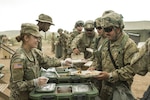 Soldiers assigned to 1st Armored Division receive meals during the Iron Focus exercise. In addition to physical exercise, proper nutrition plays a major role in overall health, fitness, and training for the Army Combat Fitness Test, says an Army dietitian.