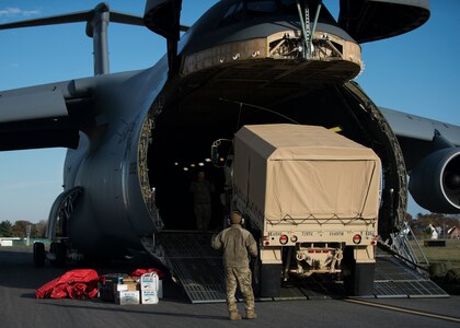 A C-5M Super Galaxy is unloaded during Total Force/Joint Training Exercise Diamond Wing at New Castle Air National Guard Base, Del., Nov. 14, 2019. The C-5M Super Galaxy is the largest strategic airlifter in the Department of Defense, capable of carrying more than 280,000 pounds of cargo.