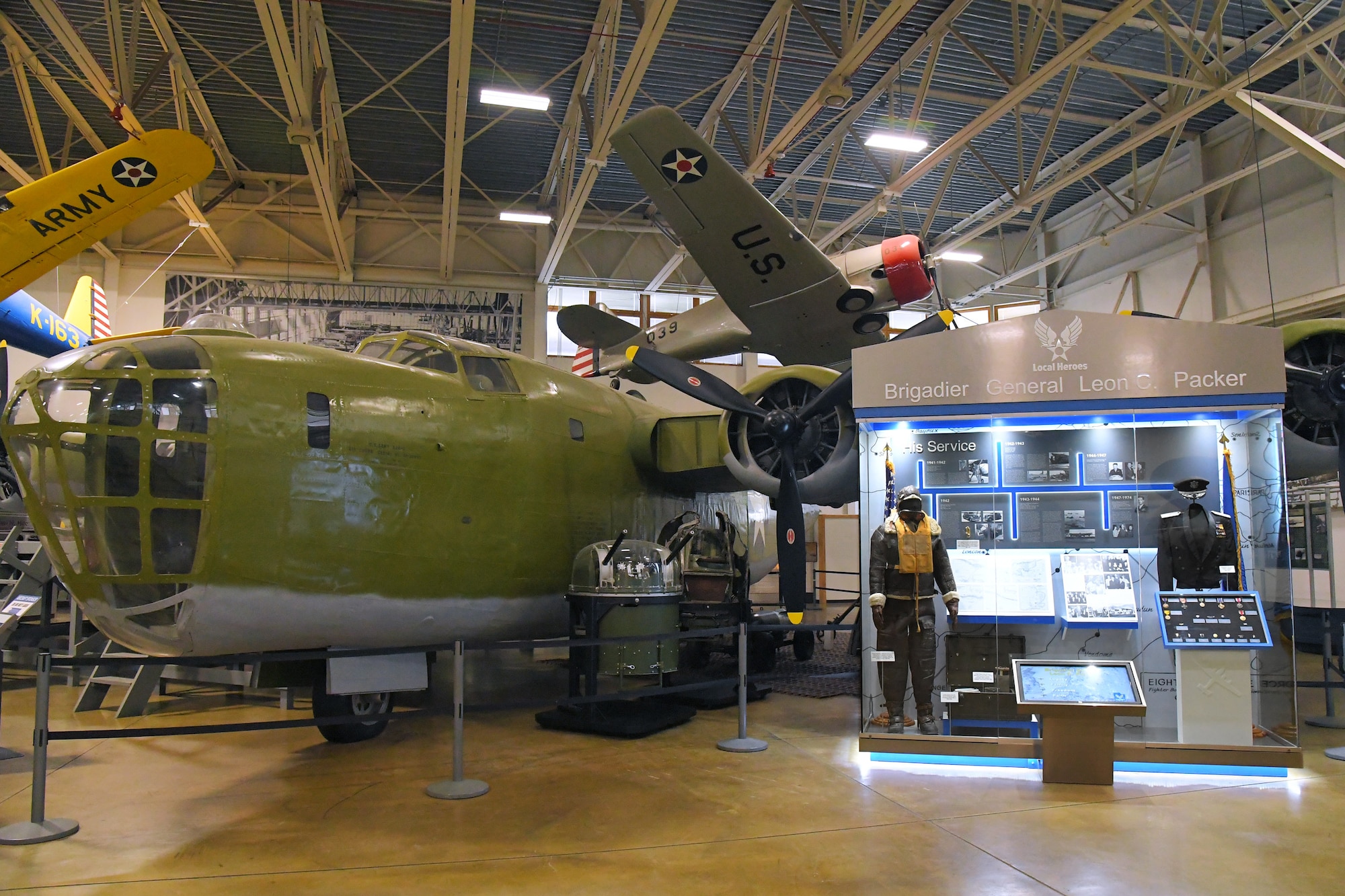 A new local heroes exhibit beside B-24 static display at the Hill Aerospace Museum, Oct. 26, 2019, at Hill Air Force Base, Utah.  Brig. Gen. Leon C. Packer was first inductee into the exhibit series that is intended to preserve the rich heritage of Utah’s Airmen heroes and the contributions they made in the nation’s defense. The general served as a bomber pilot in World War II. (U.S. Air Force photo by Todd Cromar)