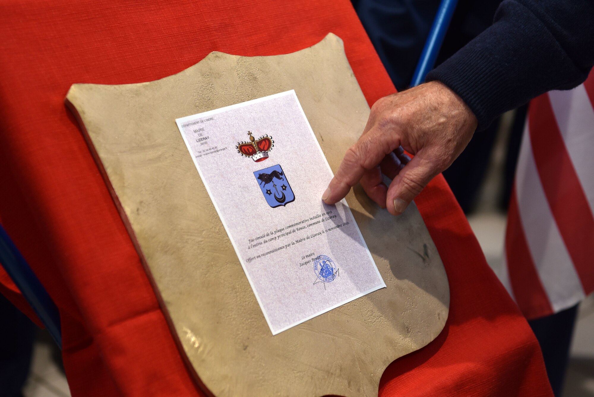 Local leaders of Lizeray, France, presented 32nd Aerial Refueling Squadron Airmen a reproduction plaque after an Armistice Day ceremony in Issuodun, France, on Nov. 11, 2019. The original plaque was once hung in the 3rd Aviation Instruction Center, where American pilots trained during World War I. (U.S. Air Force photo by Tech. Sgt. Chris Powell)