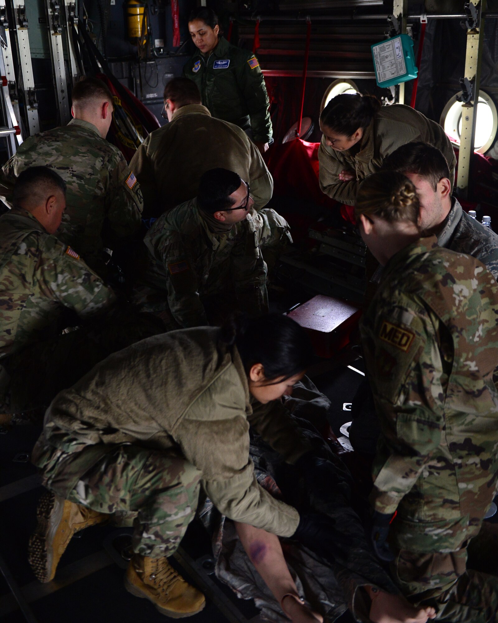 U.S. Air Force and Army medical professionals assess simulated casualties during a training event at Ramstein Air Base, Germany, Nov. 15, 2019. The training provided an opportunity to familiarize Airmen and Soldiers with their sister service’s specific duties and capabilities which will be used to craft future training opportunities. (U.S. Air Force photo by Staff Sgt. Jimmie D. Pike)
