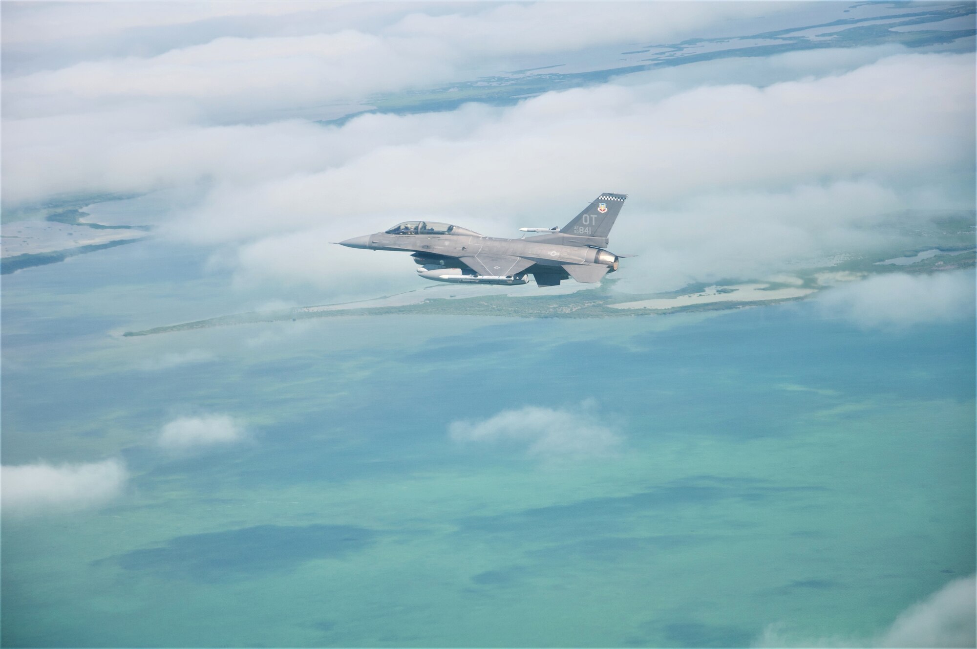 U.S. Air Force F-16 Pilot, Lt. Col. Matthew Russell, from the 85th Test and Evaluation Squadron, Eglin AFB, Fla. flies in preparation to flyover the Miami Dolphins' stadium on November 17, 2019