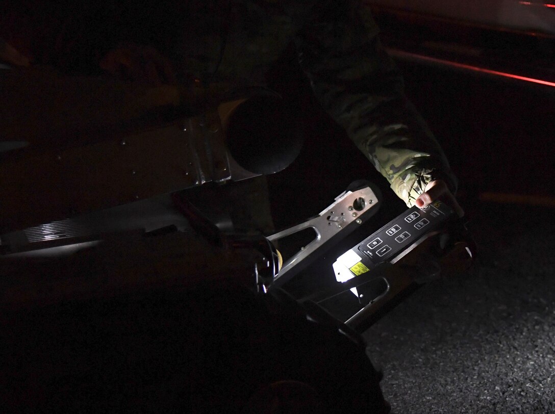 Senior Airman Rachel Zirkle, 436th Civil Engineer Squadron explosive ordnance disposal journeyman, prepares a robot to respond to a suspicious package scenario during exercise Dover Operational Readiness for a Multi-domain Agile Response at Dover Air Force Base, Del., Nov. 13, 2019. EOD Airmen are trained to detect, disarm, detonate and dispose of explosive threats. (U.S. Air Force photo by Senior Airman Eric M. Fisher)