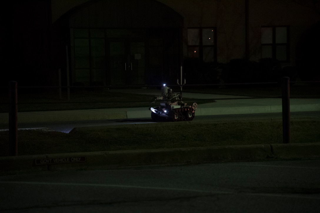 A 436th Civil Engineer Squadron explosive ordnance disposal robot moves into position during a suspicious package scenario as part of exercise Dover Operational Readiness for a Multi-domain Agile Response at Dover Air Force Base, Del., Nov. 13, 2019. DORMAR was a four-day exercise testing the installation’s ability to respond to various scenarios, including emergency response and rapid deployment. (U.S. Air Force photo by Senior Airman Eric M. Fisher)