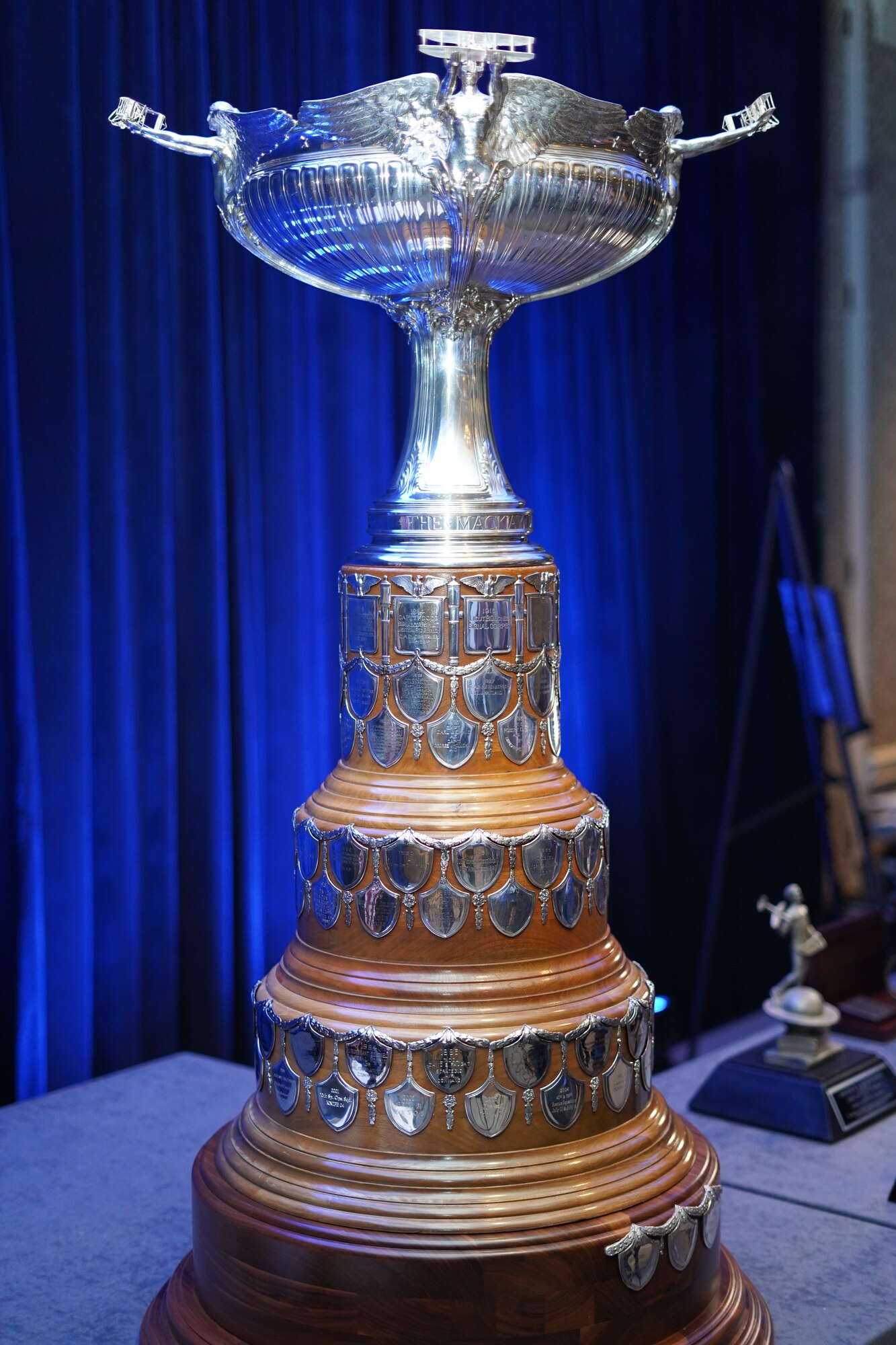 A trophy sits on top of a table.