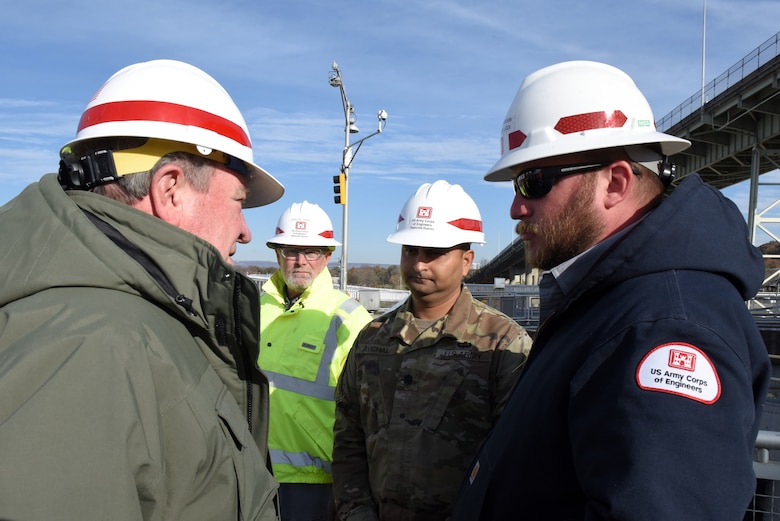 Tommy Long (Left), U.S. Army Corps of Engineers Nashville District resident engineer, gives an update on the Chickamauga Lock Replacement Project while overlooking ongoing construction to R.D. James, assistant secretary of the Army for Civil Works, during a walking tour Nov. 14, 2019 at Chickamauga Lock on the Tennessee River in Chattanooga, Tenn. (USACE photo by Lee Roberts)