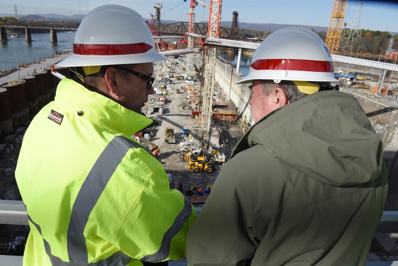 Tommy Long (Left), U.S. Army Corps of Engineers Nashville District resident engineer, gives an update on the Chickamauga Lock Replacement Project while overlooking ongoing construction to R.D. James, assistant secretary of the Army for Civil Works, during a walking tour Nov. 14, 2019 at Chickamauga Lock on the Tennessee River in Chattanooga, Tenn. The Nashville District is constructing a new 110-foot by 600-foot navigation lock at the Tennessee Valley Authority project. (USACE photo by Lee Roberts)