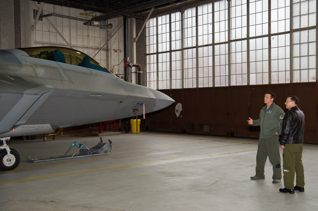 Royal Canadian Air Force Major-General Derek Joyce, Continental North American Aerospace Defense Command Region deputy commander, tours the F-22 Raptor at Joint Base Langley-Eustis, Virginia, Nov. 18, 2019.