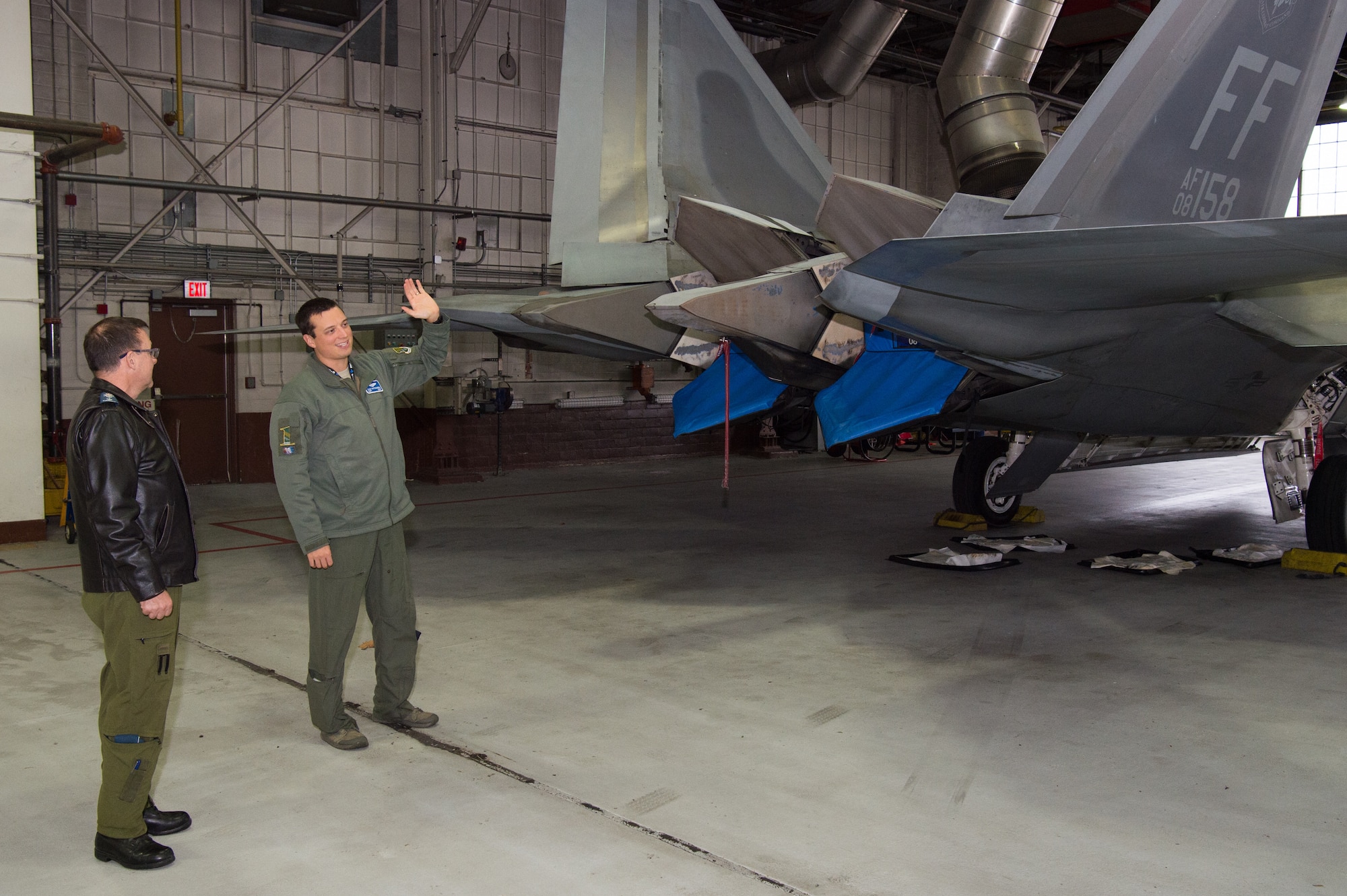 Royal Canadian Air Force Major-General Derek Joyce, Continental North American Aerospace Defense Command Region deputy commander, tours the F-22 Raptor at Joint Base Langley-Eustis, Virginia, Nov. 18, 2019.