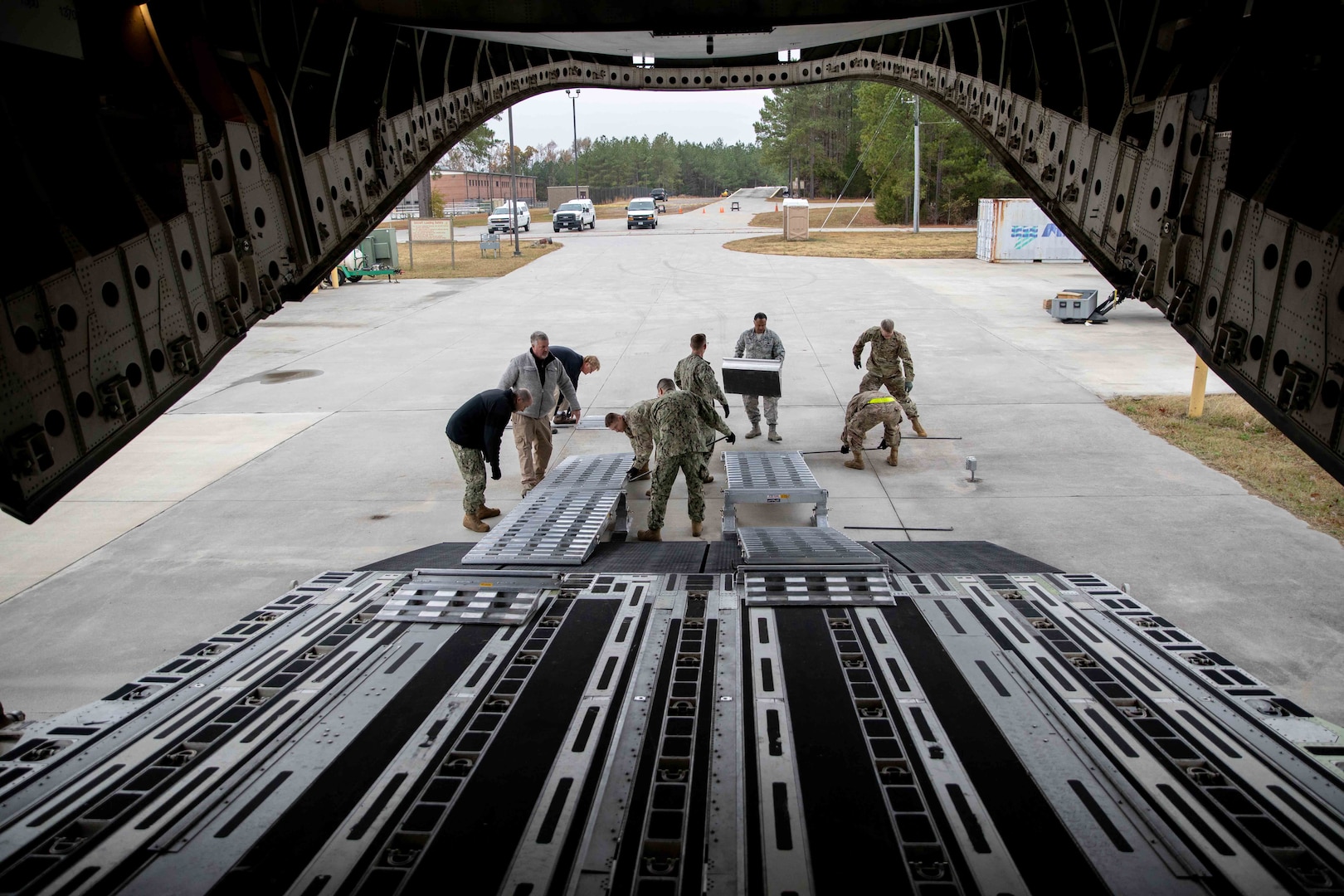 Joint Task Force Civil Support (JTF-CS) set up a box truck loading ramp on a mock C-17 aircraft as part of aircraft load training. JTF-CS holds this type of training at least once quarterly to build personnel proficiency and confidence in aircraft loading procedures. (DoD photo by Chief Mass Communication Specialist Barry Riley/RELEASED)