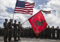 Marines with Combat Logistics Battalion 11 present colors aboard the USS Harpers Ferry.