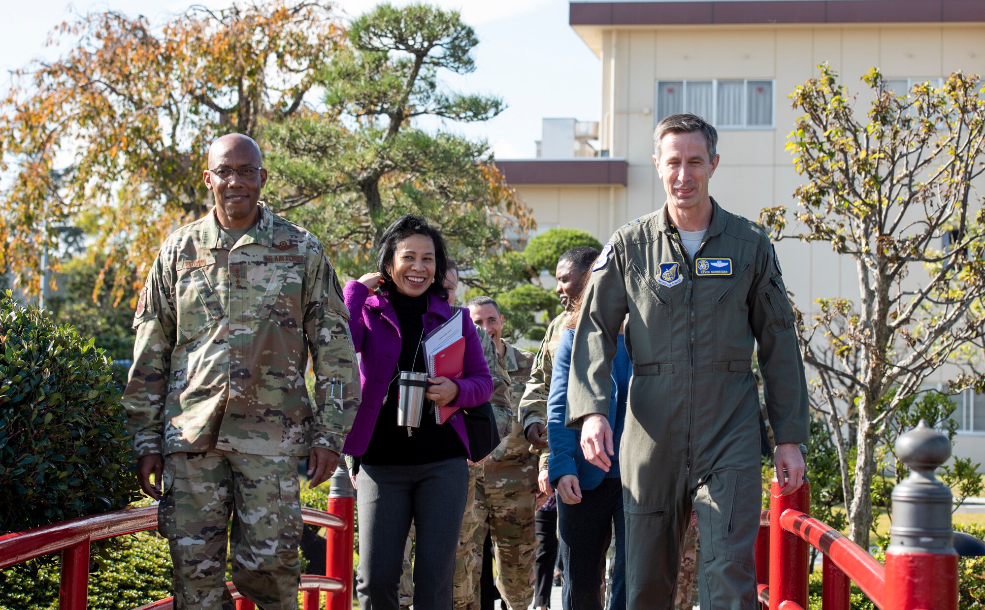 Gen. CQ Brown, Jr., Pacific Air Forces commander, and Lt. Gen. Kevin B. Schneider, U.S. Forces Japan and 5th Air Force commander, walk through the 374th Operations Group Garden, Nov. 14, 2019, at Yokota Air Base, Japan.