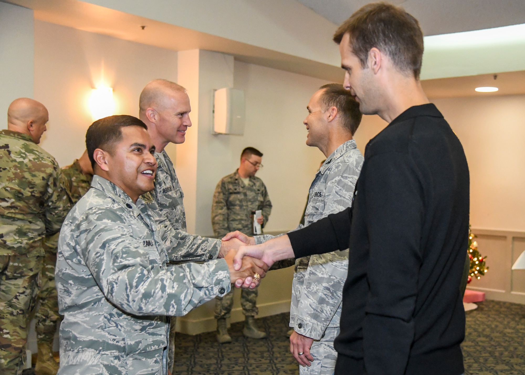 Lt. Col. Ever Zavala, Commander of Detachment 1, 47th Cyberspace Test Squadron, 96th Cyberspace Test Group, 96th Test Wing, greets members of Team Edwards following the detachment’s activation ceremony at Edwards Air Force Base, California, Nov. 19. (Air Force photo by Giancarlo Casem)