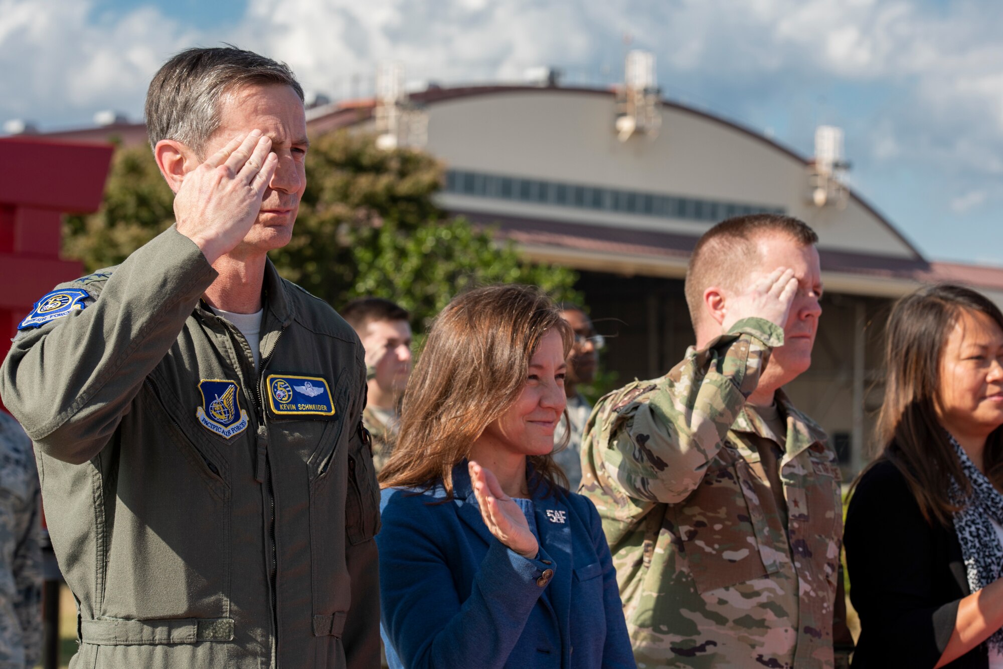 The departure party salutes for the official departure of Gen. CQ Brown, Jr., Pacific Air Forces commander, Nov. 14, 2019, at Yokota Air Base, Japan.