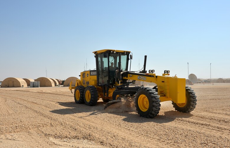 U.S. Air Force Airmen with the 1st Expeditionary Civil Engineering Group, level the ground at Prince Sultan Air Base (PSAB), Kingdom of Saudi Arabia (KSA), October 16, 2019.