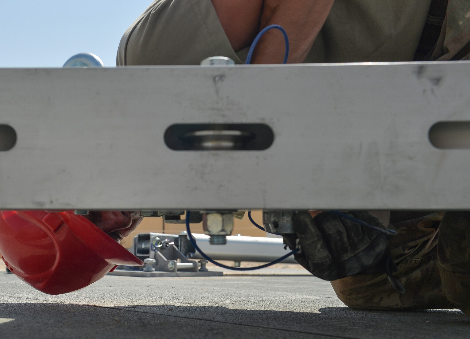 U.S. Air Force Tech. Sgt. Lance Haul, 378th Expeditionary Civil Engineering Squadron, attaches screws onto the arch of a 6,500 square foot structural dome Oct. 18. 2019, at Prince Sultan Air Base (PSAB), Kingdom of Saudi Arabia (KSA).