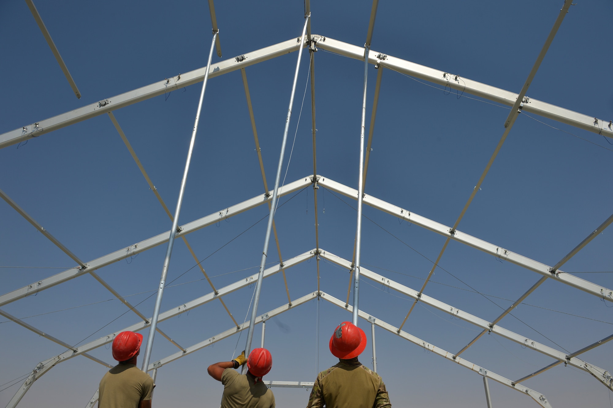 U.S. Air Force Airmen with the 378th Expeditionary Civil Engineering Squadron, build a 6, 500 square foot structural dome October 18, 2019, at Prince Sultan Air Base (PSAB), Kingdom of Saudi Arabia (KSA).