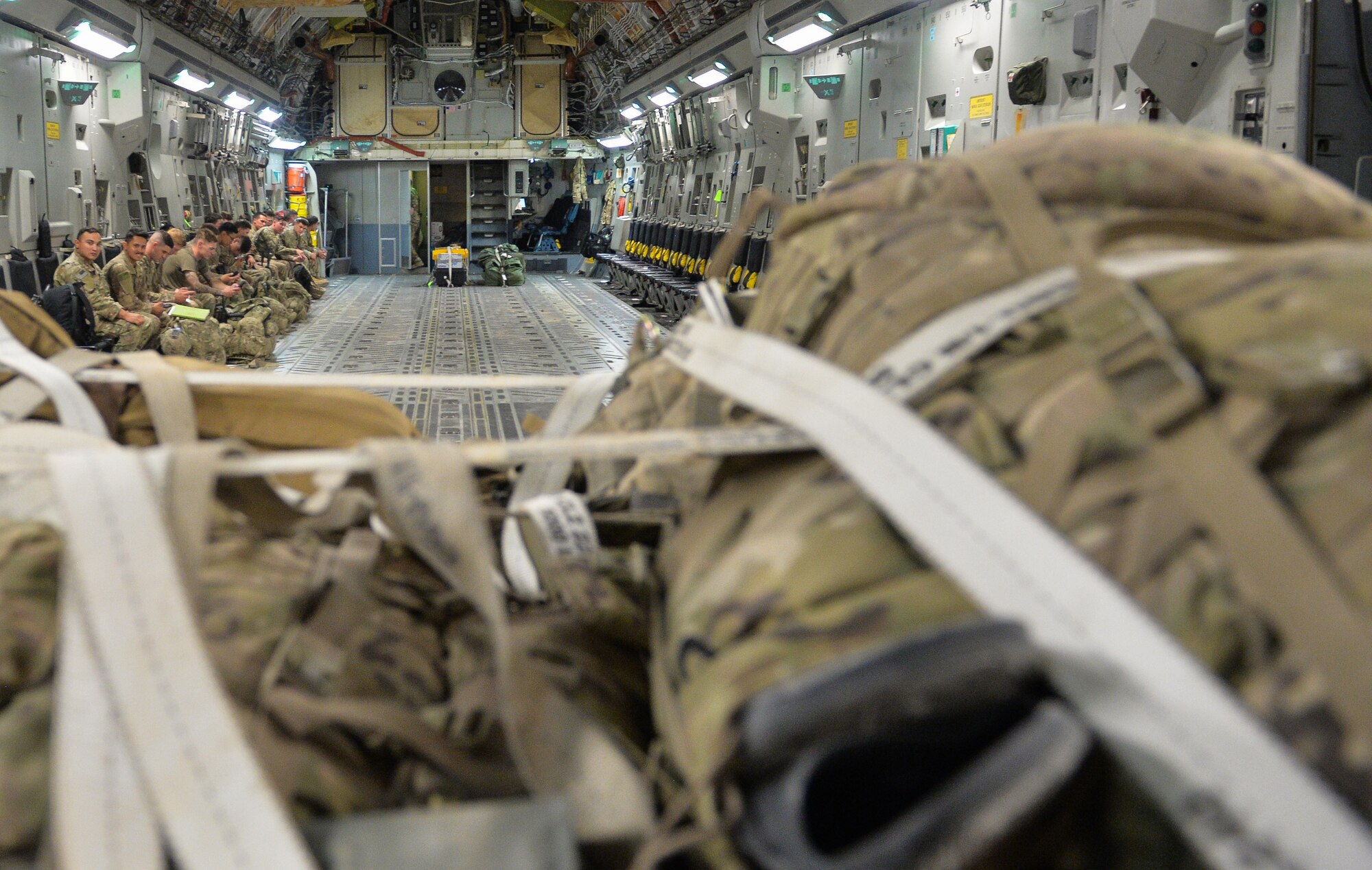U.S. Army Soldiers with the 4th Infantry Division, board a C-17 Globemaster III at Prince Sultan Air Base (PSAB), Kingdom of Saudi Arabia (KSA), October 23, 2109.