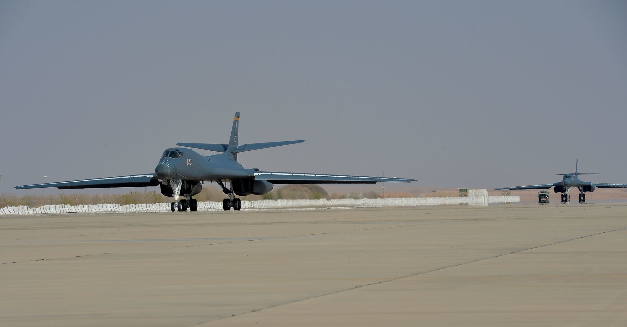 B1-B Lancers from Ellsworth Air Force Base toches down at Prince Sultan Air Base, Kingdom of Saudi Arabia, Oct. 25, 2109.