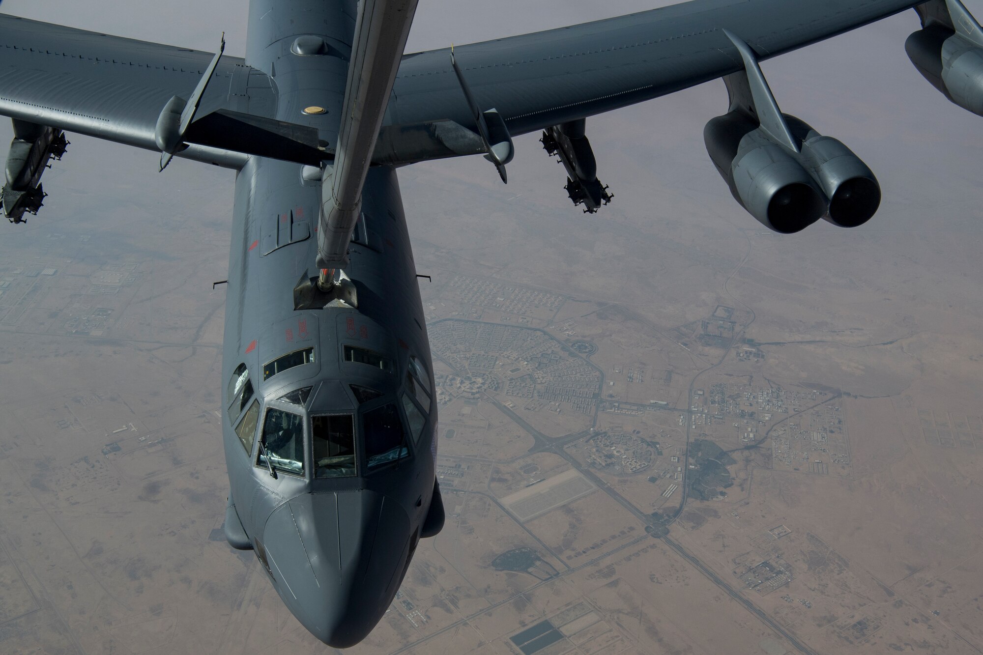 A United States Air Force B-52H Stratofortress receives fuel via aerial refueling from a KC-10 Extender above the Arabian Gulf, Nov. 1, 2019.