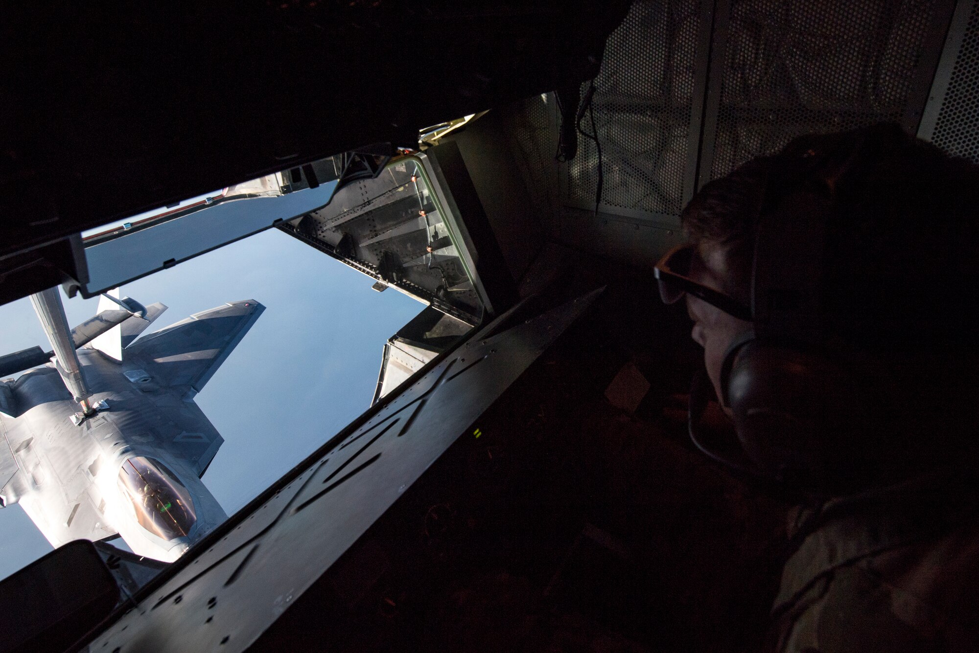 A United States Air Force F-22 Raptor receives fuel via aerial refueling from a KC-10 Extender above the Arabian Gulf, Nov. 1, 2019.