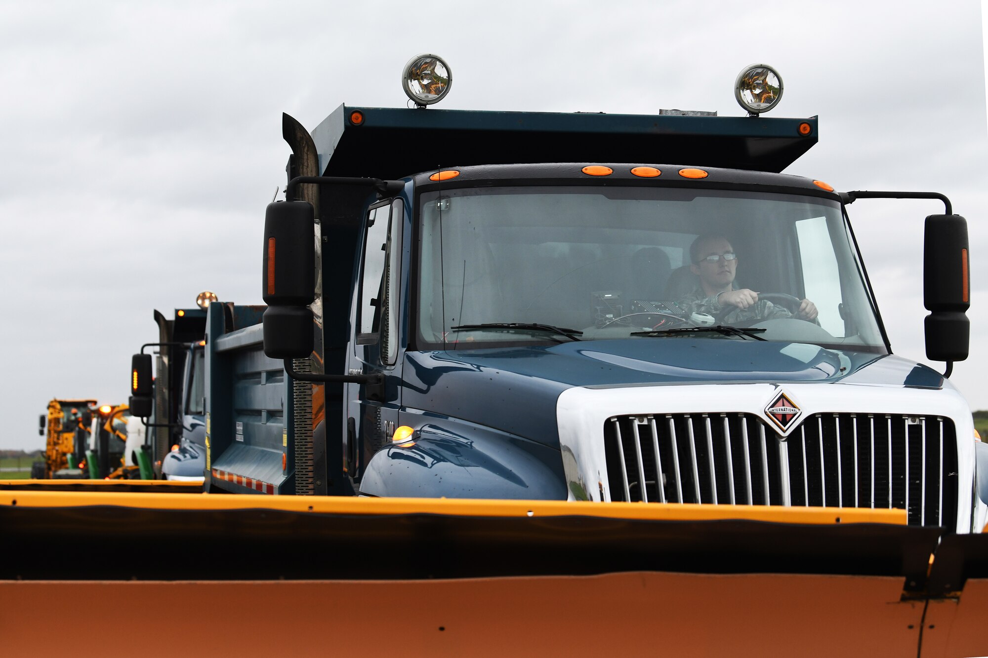 Snow and ice removal equipment assigned to the 48th Civil Engineer Squadron is displayed at Royal Air Force Lakenheath, England, Nov. 15, 2019.  The 48th CES operates a fleet of 12 various pieces of machines to support the installation through snow and ice removal capabilities during inclement weather.  (U.S. Air Force photo by Senior Airman Shanice Williams-Jones)