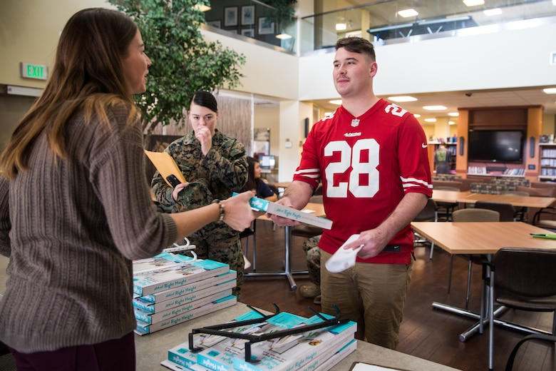 April Mitchell, entrepreneur, speaks with Marines at Wounded Warriors Battalion - West on Marine Corps Base Camp Pendleton, California, Nov. 15, 2019. Mitchell, a military spouse, created a new door hook in hopes of giving individuals with less mobility more independence. Mitchell is a native of Lake Mills, Wisconsin.