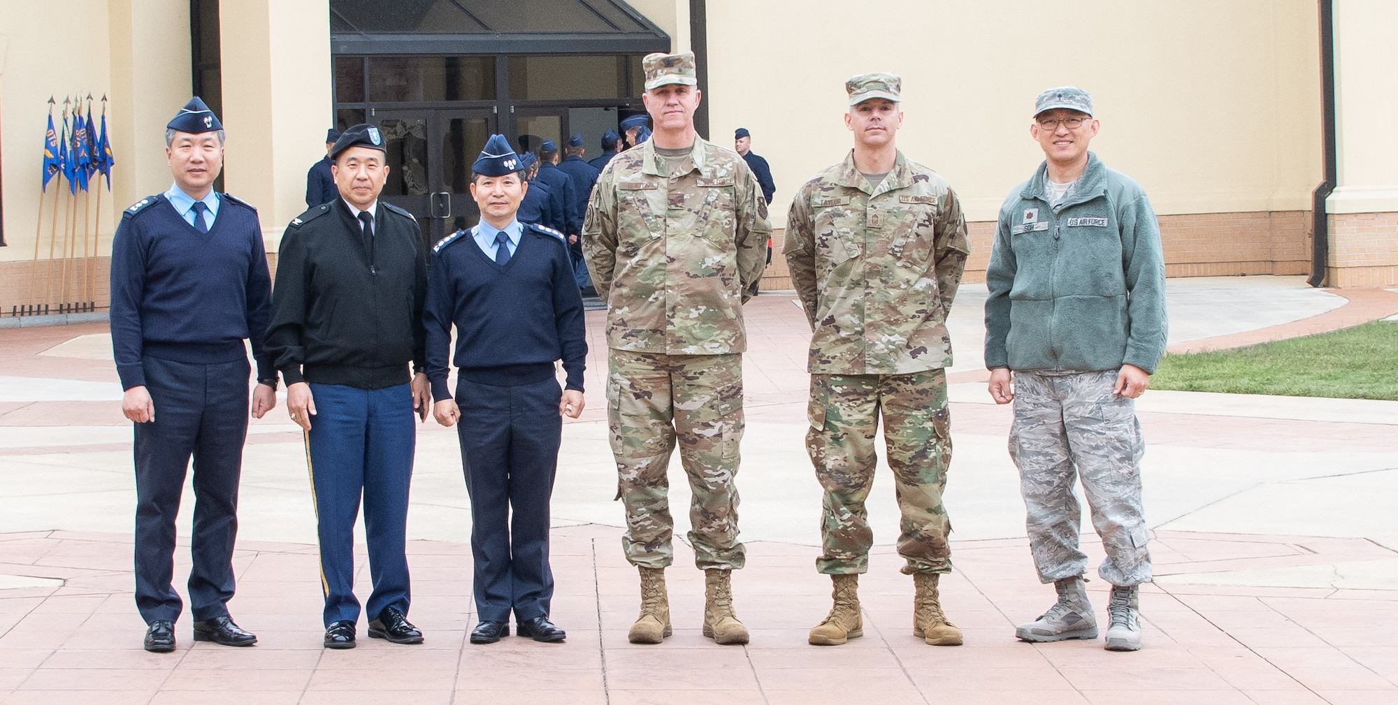 Chaplain, Lt. Col. Ilwoo Lee, Republic of Korea Air Force, upcoming ROKAF Chief of Chaplains, Chaplain, Col. Samuel Lee, United Nations Command, Combined Forces Command and United States Forces Korea Command chaplain, Chaplain, Col. Kwang-Nam Na, ROKAF Chief of Chaplains, Chaplain, Col. Michael Newton, Air Force Chaplain Corps College Commandant; Chief Master Sgt. Michael Taylor, AFCCC chief, Chaplain, and Maj. Shin Soh, interpreter, stand together during Na’s visit to Air University Nov. 13-15, 2019, at Maxwell, Air Force Base, Alabama. The visit, as a whole, was held to signify their commitment to strengthening national and functional alliances in support of the Secretary of the Air Force’s priorities.