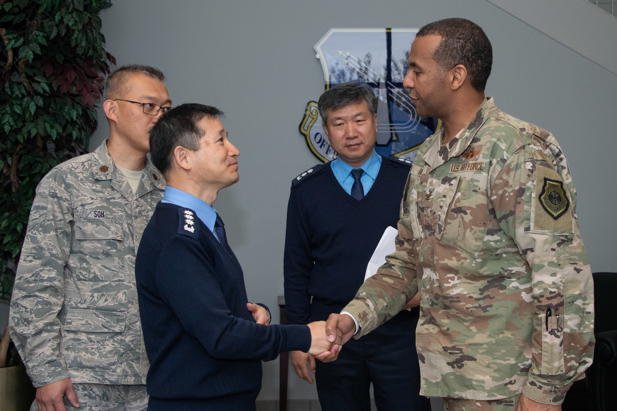 Chaplain, Col. Kwang-Nam Na, Republic of Korea Air Force Chief of Chaplains extends gratitude to Col. Peter Bailey, Officer Training School commandant, for providing an OTS mission brief and campus tour during Na’s visit to Air University Nov. 13-15, 2019, at Maxwell, Air Force Base, Alabama. The visit, as a whole, was held to signify their commitment to strengthening national and functional alliances in support of the Secretary of the Air Force’s priorities.