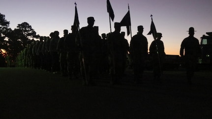 Trainees march in formation to breakfast at Camp Shelby Joint Force Training Center, Nov. 16, 2019, during the Mississippi Army National Guard Recruiting and Retention Battalion’s annual Spartan Forge event.