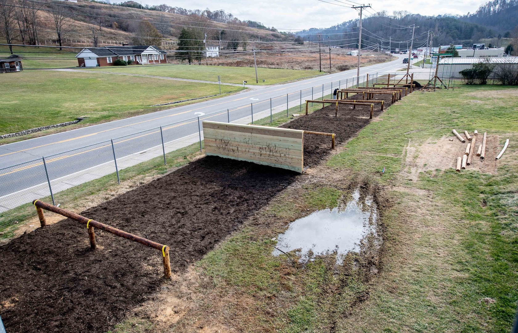 Photo depicting the completion of the Sissonville High School Marine Corps Junior Reserve Officer Training Corps (MCJROTC) obstacle course. (U.S. Army National Guard photo by Bo Wriston)