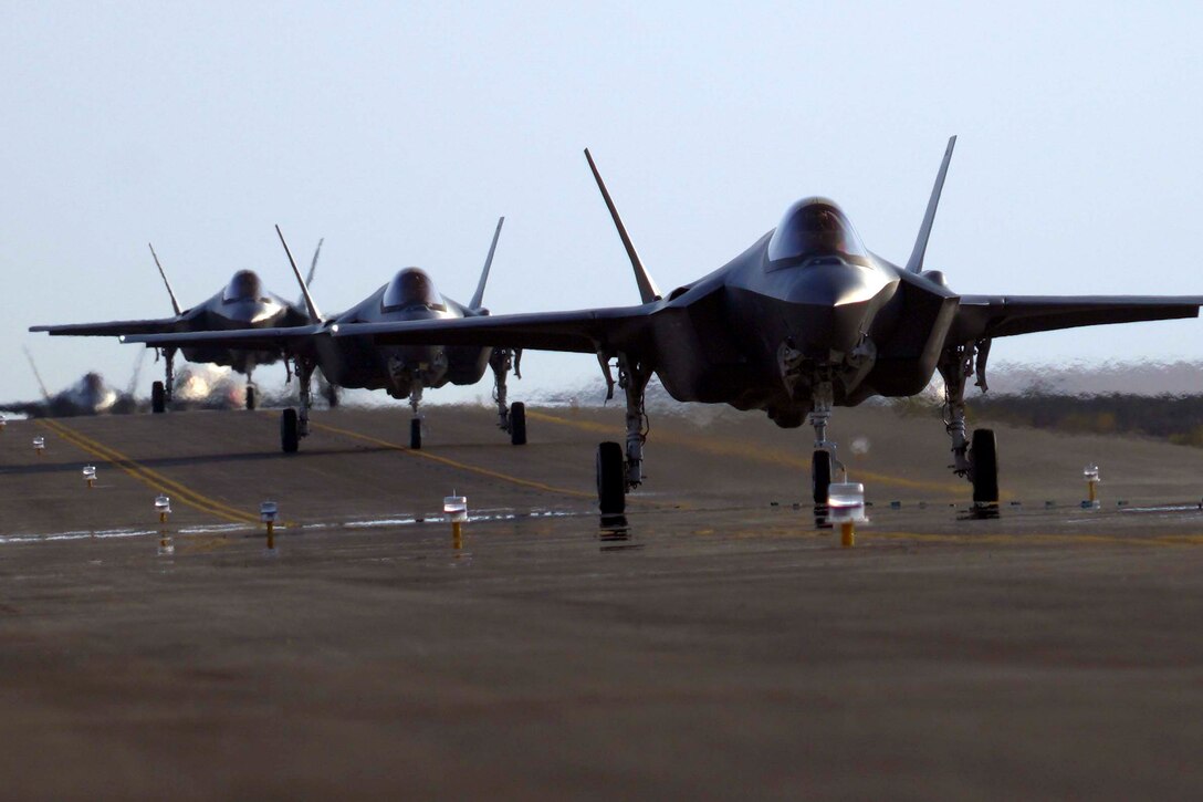 Three planes lined up in front of each other.