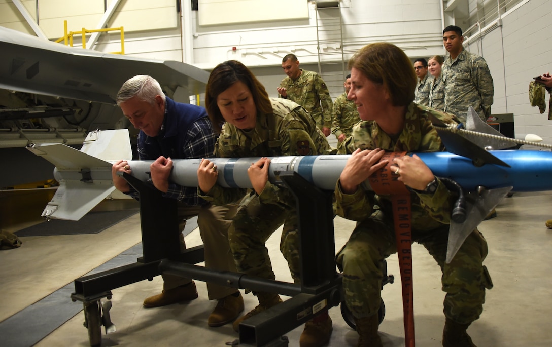 Leadership loads a missile launcher