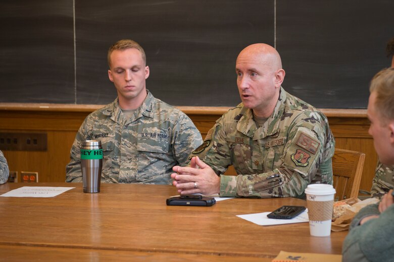 Maj. William Deme (right), Commander of the 103rd Security Forces Squadron, speaks to cadets assigned to Air Force ROTC Detachment 009 at Yale University, during a panel discussion, November 14, 2019. The discussion was held to meet ROTC training objectives, which require cadets to gain exposure to the operational Air Force environment by interacting with active Air Force members. (U.S. Air National Guard photo by Tech. Sgt. Tamara R. Dabney)